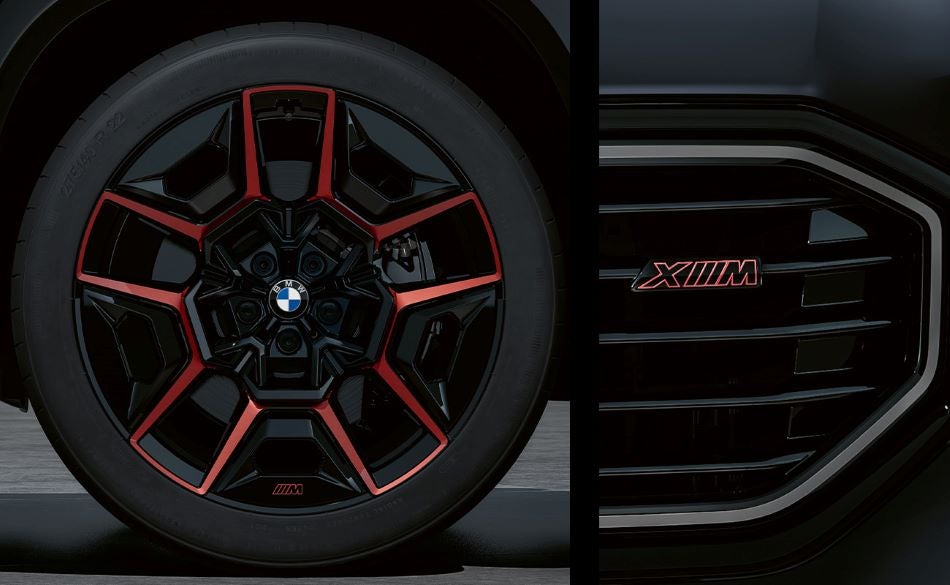 Detailed images of exclusive 22” M Wheels with red accents and XM badging on Illuminated Kidney Grille. in BMW of Madison | Madison WI